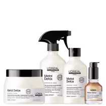 A imagem mostra um kit L'Oréal Professionnel com um frasco cilíndrico de shampoo, um spray pré tratamento um pote redondo de máscara capilar, todos de cor branca, com rótulo branco e tampa preta. Além de um óleo com frasco de vidro transparente e pump.