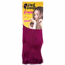 Extensões de cabelo da marca Black Beauty. A embalagem é de cor amarela com o texto "Black Beauty Braids" em destaque.