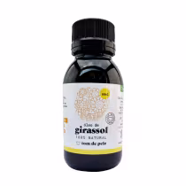 Frasco de óleo de girassol 100% natural da marca Tom de Pele, com rótulo branco e amarelo destacando o nome do produto e a informação de que é um óleo natural.