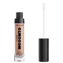 A imagem mostra um corretivo líquido da marca de cosméticos Wet n Wild chamado "Incognito". O produto é descrito como "Cobertura Total o Dia Todo" e apresenta um aplicador em forma de pincel integrado à embalagem.