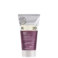 A embalagem é um tubo plástico roxo, branco e prateado com detalhes em dourado. O rótulo frontal apresenta o nome do produto e informações como "para fortalecer e criar ligações".