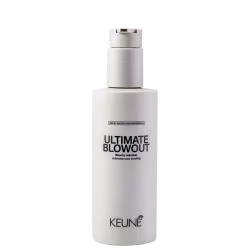 A imagem mostra o produto Ultimate Blowout, da marca Keune. Embalagem plástica bege opaca com pump dosador. Rótulo com o texto "ULTIMATE BLOWOUT Blowdry volumizer Volumisateur pour brushing" em letras pretas maiúsculas.