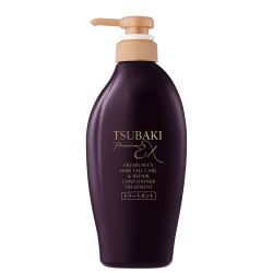 Frasco de condicionador Tsubaki Premium EX de 450ml, com embalagem roxa escura e rótulo dourado destacando os benefícios do produto.