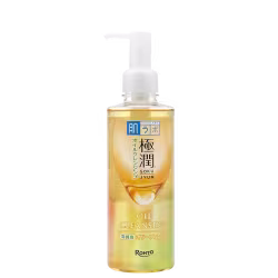 Frasco de limpeza facial em óleo da marca Rohto, com bomba dosadora, em embalagem de vidro transparente com rótulo azul e amarelo. O produto é chamado de "Hada Labo Gokujyun Cleansing Oil".