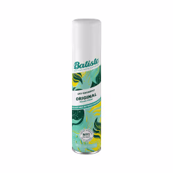 Shampoo seco da marca Batiste, na versão "Original". A embalagem é cilíndrica, de cor branca, com detalhes em verde e amarelo. Possui um design gráfico com elementos estilizados, sugerindo uma limpeza suave e refrescante dos cabelos.