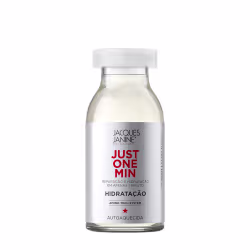 Frasco de vidro transparente com tampa branca contendo um líquido claro. Rótulo branco com texto "JACQUES JANINE" e "JUST ONE MIN" em vermelho, indicando um produto de hidratação rápida.