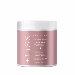 Embalagem de máscara capilar da linha Jacques Janine Professionnel, em recipiente branco com detalhes em rosa, indicando alinhamento dos fios e redução do volume, com fórmula vegana.