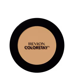 Pó compacto de maquiagem Revlon em embalagem redonda preta. A superfície do pó tem uma cor bege claro uniforme. A tampa transparente exibe o logotipo "Revlon" em letras brancas. O produto apresenta um design minimalista e elegante.