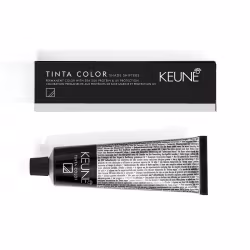 Produto de coloração permanente para cabelos Tinta Color da marca Keune. Embalagem retangular preta com detalhes em branco contendo o nome do produto e da marca.