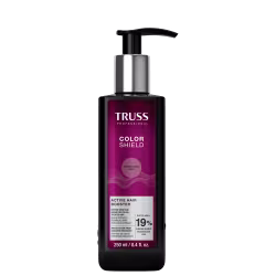 Frasco de plástico preto com bomba doseadora, rótulo roxo com texto "TRUSS PROFESSIONAL COLOR SHIELD" e "ACTIVE HAIR BOOSTER". Contém 250 ml do produto.