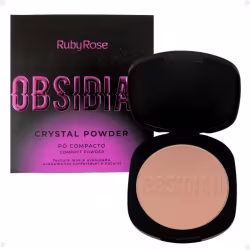 Pó compacto de Ruby Rose. A embalagem consiste em uma caixa preta com o nome do produto em letras rosa brilhante e um estojo preto contendo o pó de cor bege claro. O estojo tem o nome "Obsidia" gravado na superfície do pó.