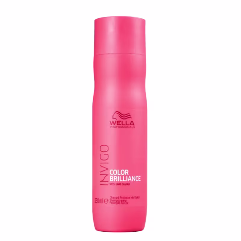 Shampoo protetor de cor da linha Color Brilliance da Wella Professionals. Embalagem cilíndrica de plástico vermelho brilhante. Rótulo com o logotipo da Wella e o nome do produto "Invigo Color Brilliance" em letras brancas.