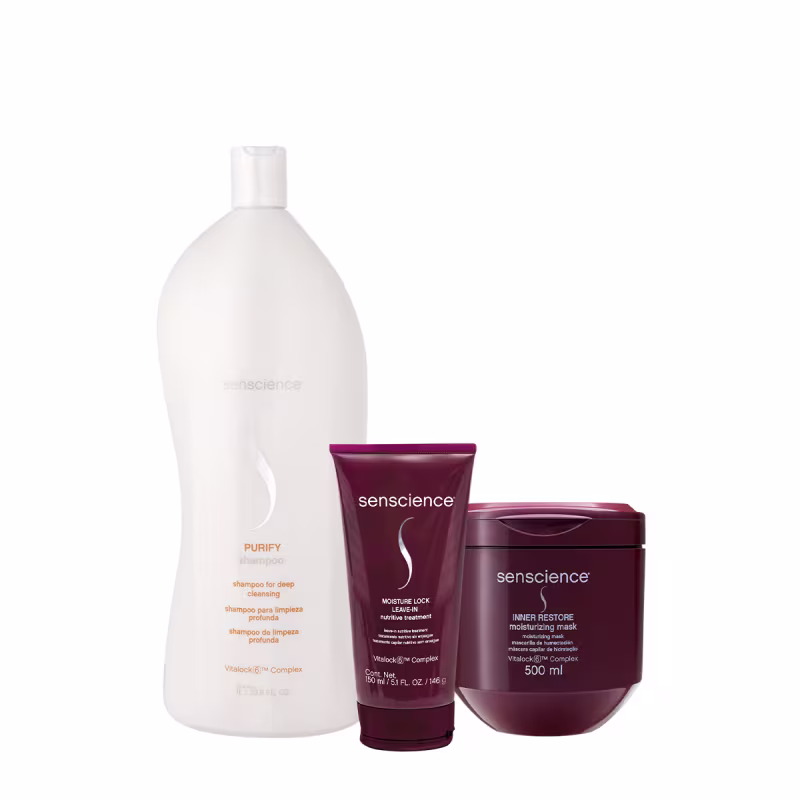 Conjunto de produtos Senscience, incluindo um frasco branco de shampoo Purify, um tubo vermelho de tratamento Moisture Lock e um pote vermelho da máscara Inner Restore.