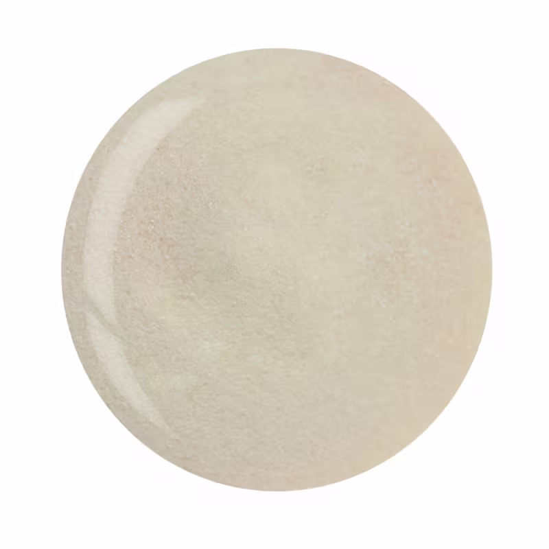 Ppó translúcido em formato circular. Sua superfície é lisa e uniforme, com uma tonalidade bege clara. Não há rótulos, marcas ou informações visíveis na imagem, portanto não é possível identificar a marca ou o tipo específico de produto.