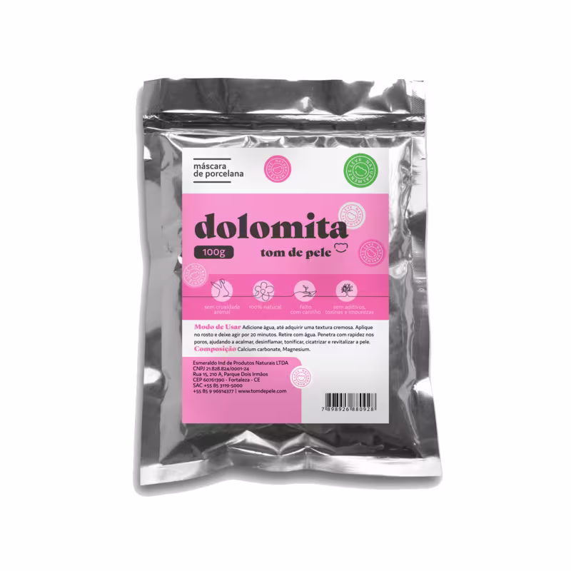 máscara de porcelana com 100g de peso. O pacote contém o nome "dolomita" em letras grandes e destaca que se trata de um "tom de pele". Há também ícones e informações sobre os benefícios e modo de uso do produto.