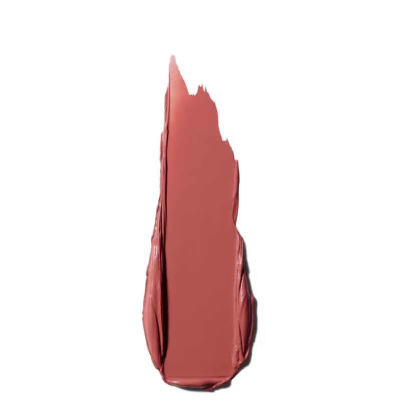 A imagem mostra um pouco do produto espalhado em um fundo branco.