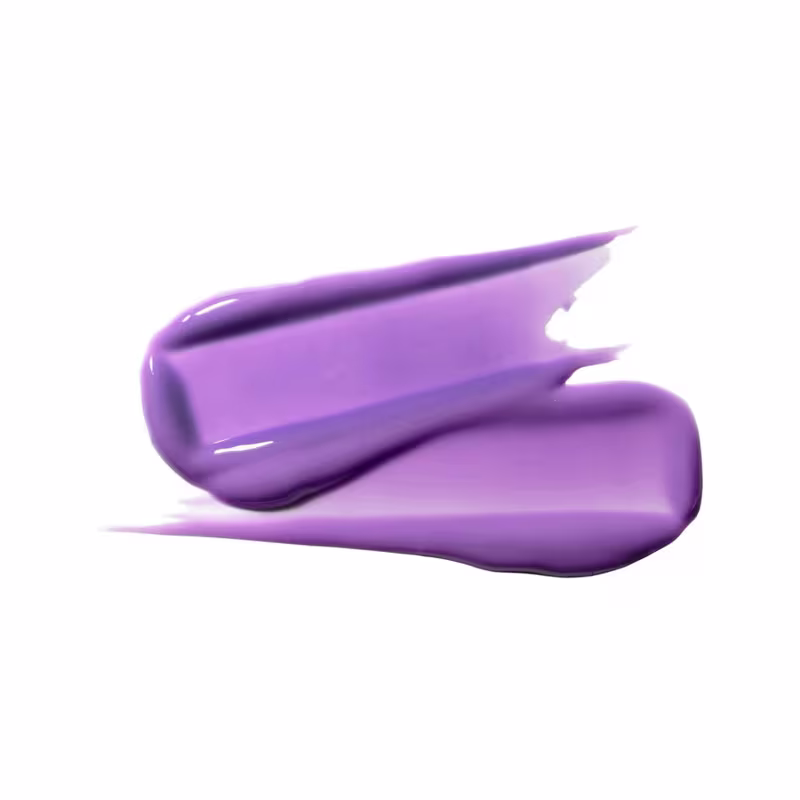 A imagem mostra um pouco do produto espalhado em um fundo branco.