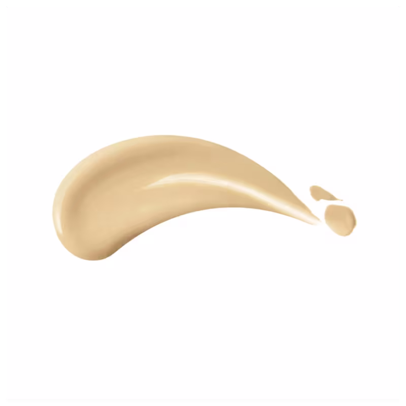 A imagem mostra uma amostra de uma base líquida, depositada em uma superfície branca. Pela foto, é possível notar que o produto apresenta textura líquida, cremosa e brilhante.