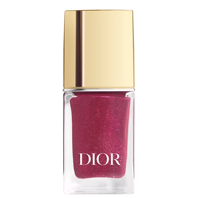 Frasco de vidro transparente com a tampa dourada.