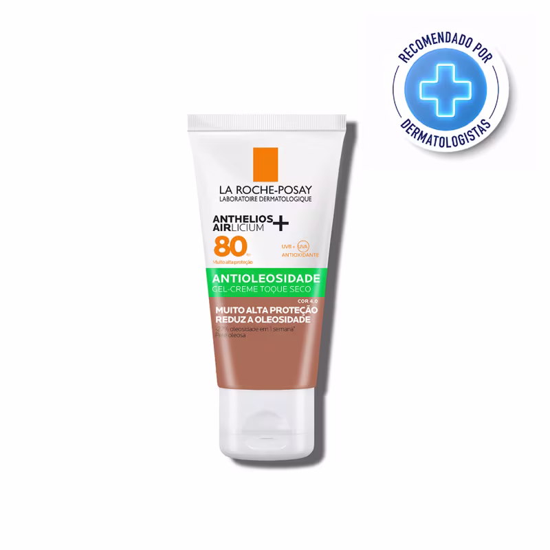 A imagem mostra uma bisnaga de protetor solar, com fundo branco e detalhe verde.