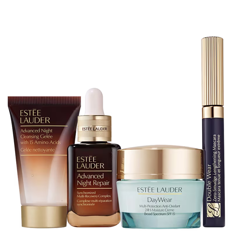 Uma variedade de produtos de cuidados com a pele da marca Estée Lauder. Um gel creme demaquilante, um sérum noturno, um creme de tratamento para pele diurno e uma máscara de cílios.