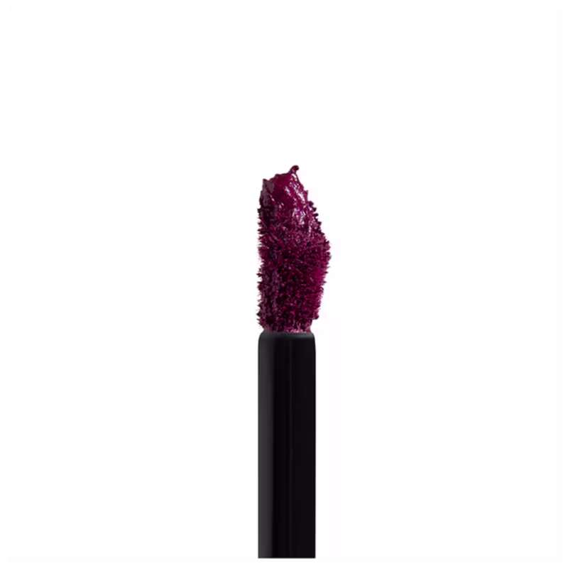 A imagem mostra de perto o pincel aplicador.