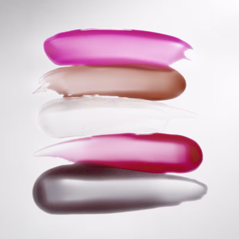 Amostra das 5 cores disponíveis do Gloss Boca Rosa Hidra Lábios:  rosa, bege, transparente, vermelho e marrom.