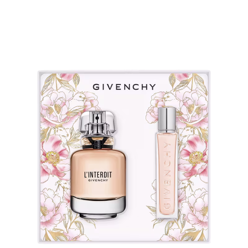 Caixa branca com flores rosa e douradas, contendo um frasco de perfume Givenchy L'Interdit e um frasco menor de amostra do mesmo perfume. O design da embalagem é elegante e floral.