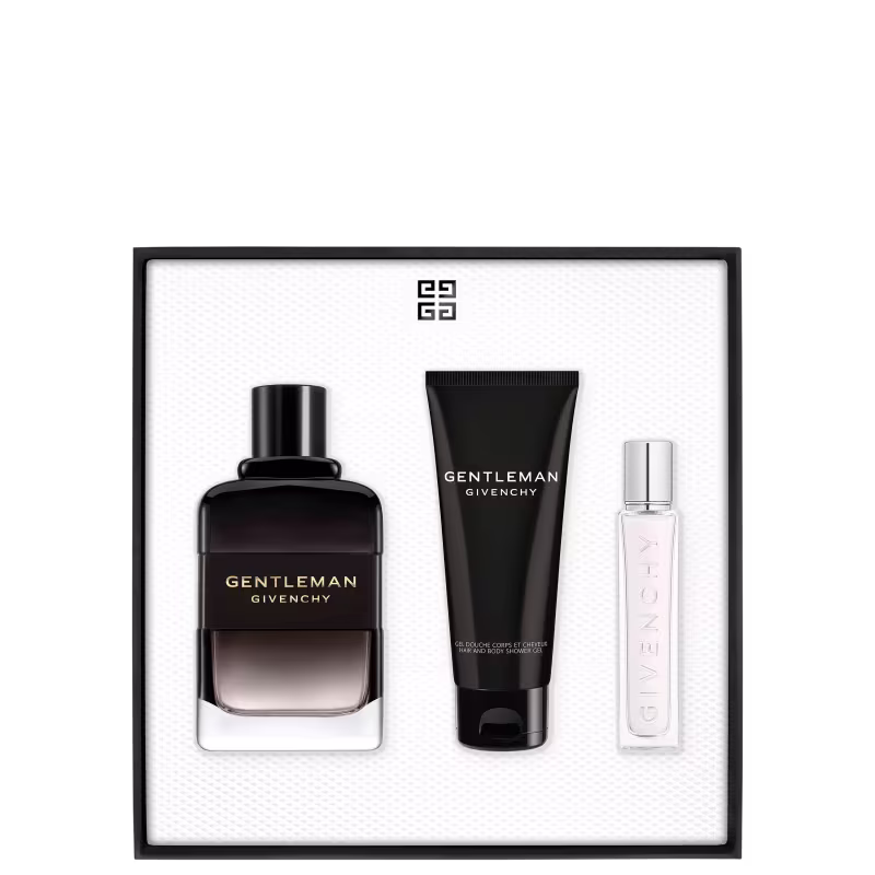 Conjunto de produtos de beleza da marca Givenchy, incluindo um frasco de perfume Gentleman Givenchy, um tubo de gel corporal e um pequeno frasco de amostra, todos em embalagens pretas e brancas com o logotipo da marca.