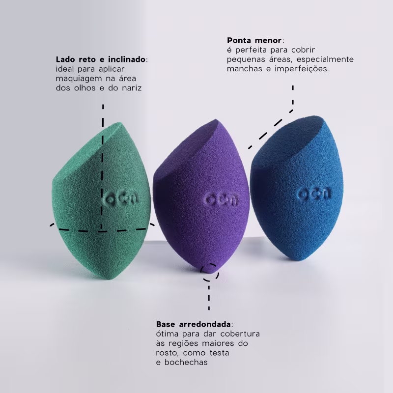 Esponjas de maquiagem, com formato assimétrico e textura macia, com o logotipo "O.C.N." impresso na superfície.