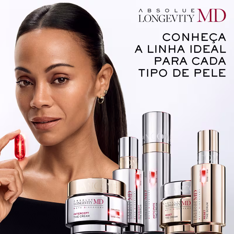 Uma mulher de pele escura segurando um item de perfumaria da marca Absolue Longevity MD, com embalagens prateadas e douradas contendo textos como "Conheça a linha ideal para cada tipo de pele" e "Intercept the cream".