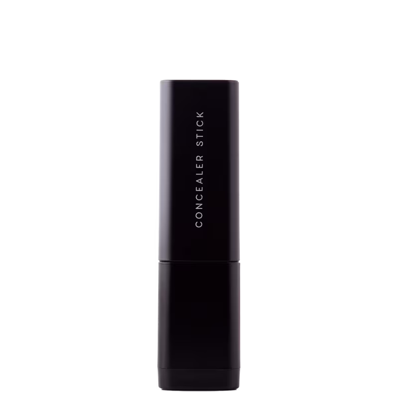 Corretivo em Bastão Océane Concealer Stick. Possui tampa preta e corpo cilíndrico preto liso. 
