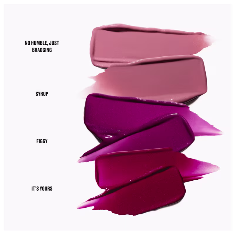Embalagens de batons em tons de rosa e roxo com textos "No humble, just bragging", "Syrup", "Figgy" e "It's yours".