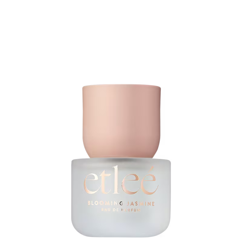 Frasco de perfume Etleé Blooming Jasmine, com embalagem  transparente e letras douradas.