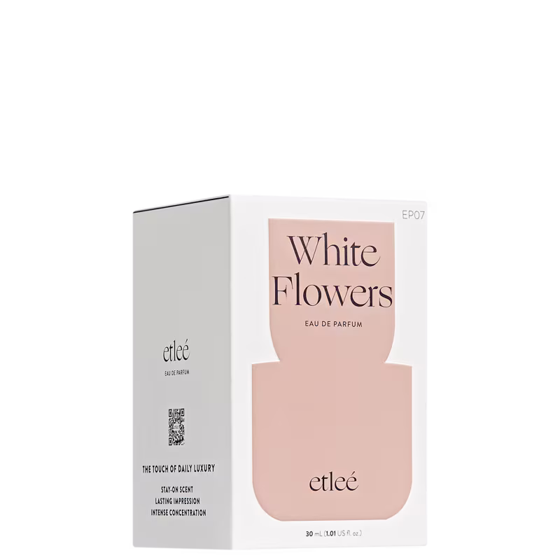 Caixa do perfume Etleé White Flowers com embalagem branca e rosa, contendo 30 ml de eau de parfum. O rótulo apresenta o nome do produto em destaque com a marca Etleé.