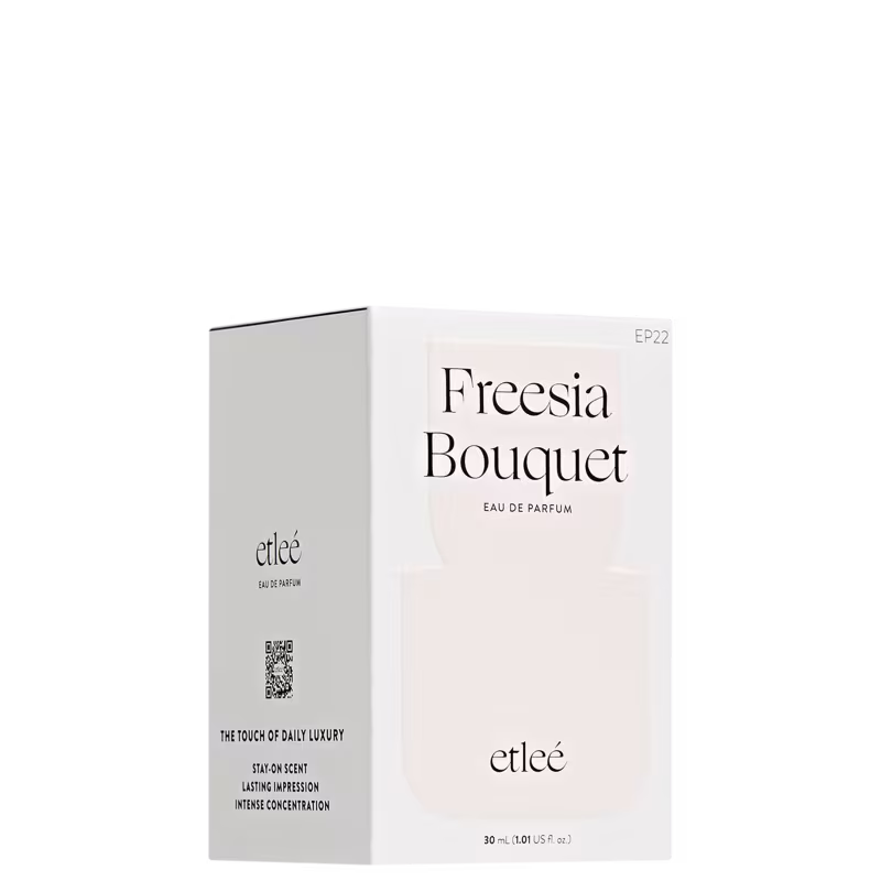 Caixa do perfume Etleé Freesia Bouquet em embalagem branca com texto preto. Produto de 30 ml, com informações sobre a fragrância e a marca impressas na caixa.