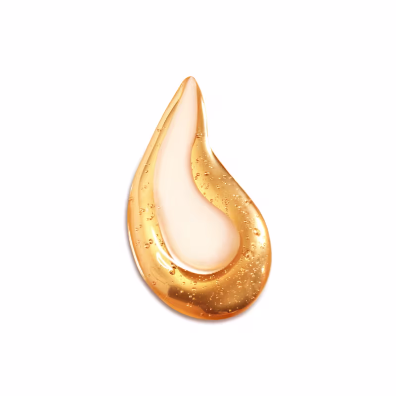 Textura fluida e brilhante, com tons dourados e translúcidos, sugerindo uma fórmula leve e sedosa, típica de produtos de beleza Guerlain.