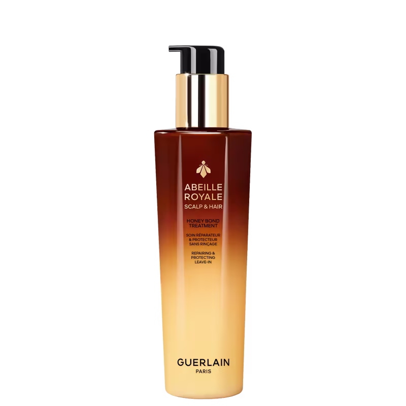Frasco de leave-in Abeille Royale da Guerlain, com embalagem em tons de marrom e dourado, contendo um produto para cuidados com o couro cabeludo e cabelos.