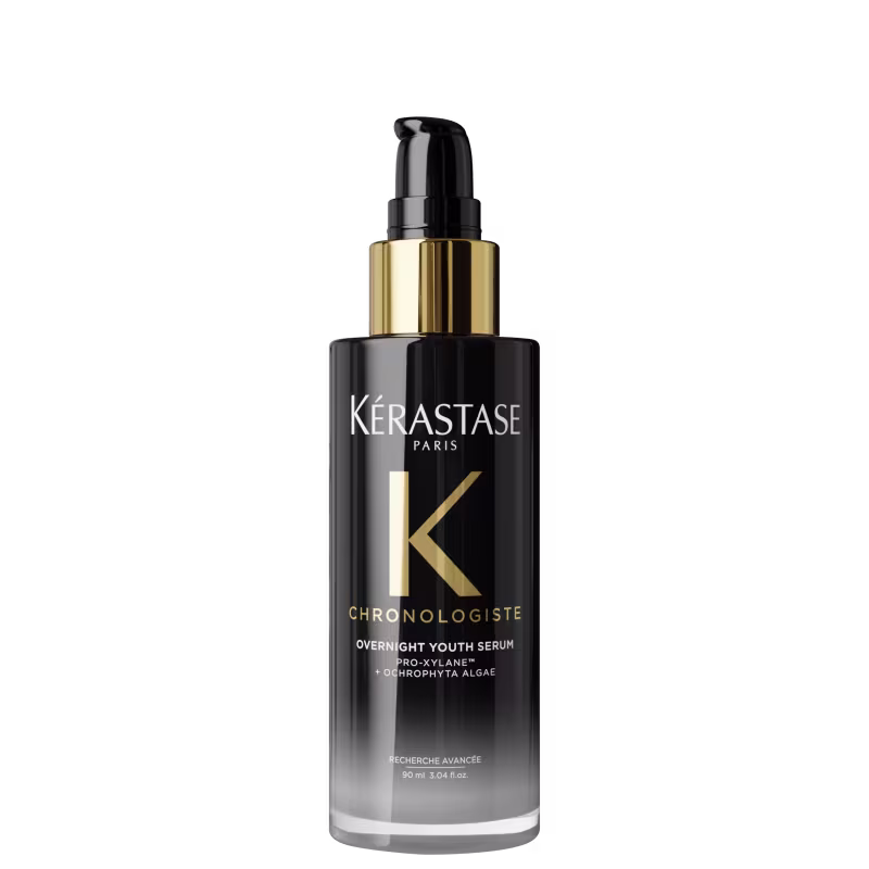 Frasco de sérum para cabelos Kérastase Chronologiste Overnight Youth Serum, com embalagem preta e dourada, contendo 90 ml do produto.