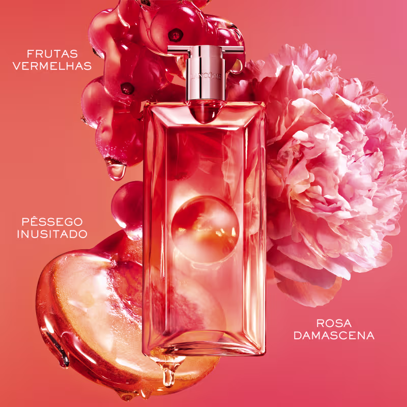 Frasco com texto "Frutas vermelhas" e "Rosa damascena", embalado em flores de peônia rosa.