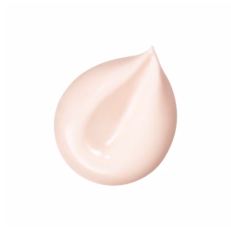 A textura deste produto de beleza Shiseido apresenta uma aparência cremosa e suave, com um tom claro e uniforme. Sua consistência parece ser leve e sedosa, transmitindo uma impressão de maciez e hidratação.