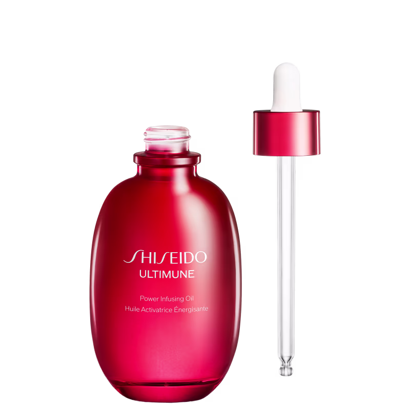 Frasco de vidro vermelho com conta-gotas da linha Ultimune da Shiseido, contendo óleo ativador de energia com texto em inglês no rótulo.