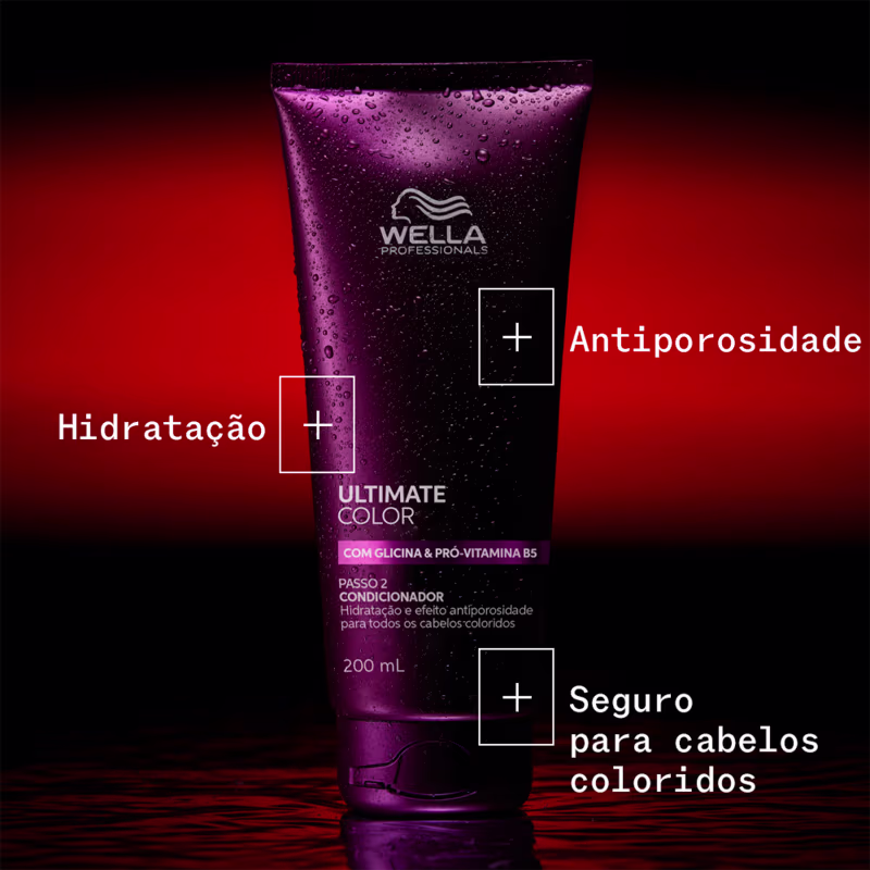 O produto de beleza da marca Wella Professionals é um condicionador para cabelos coloridos, com fórmula que promove hidratação e efeito antiporosidade, em embalagem roxa com gotas d'água, em um ambiente escuro e vermelho, sugerindo um uso profissional.