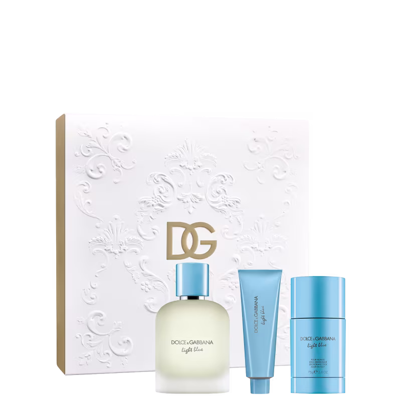 Conjunto de produtos de beleza Dolce & Gabbana Light Blue, incluindo um frasco de perfume, um tubo de shower gel e um desodorante, em uma caixa branca com detalhes florais em relevo.