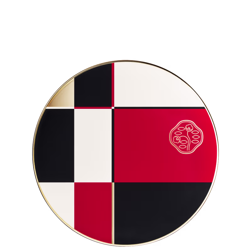 Embalagem circular em vermelho, preto e branco com logotipo da marca Shiseido em relevo, contendo produto de maquiagem.