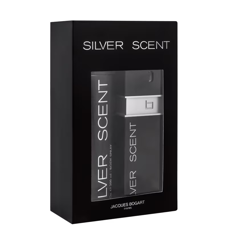 A imagem mostra uma caixa preta com o logo da marca em prata, lado de um frasco de perfume preto com detalhe prata e um body spray todo preto.