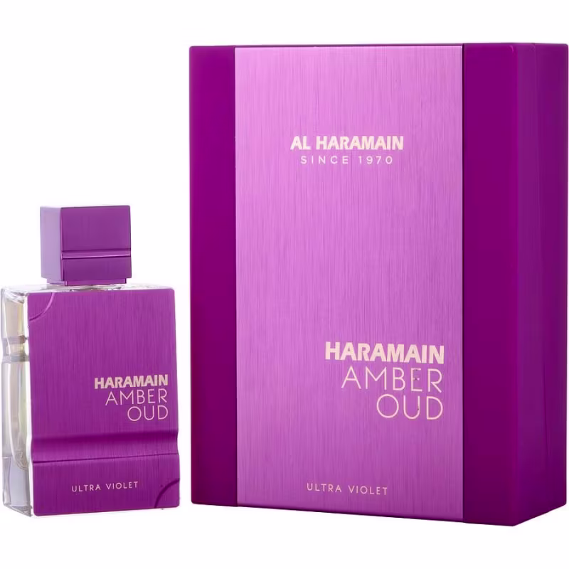 Frasco de perfume Al Haramain Amber Oud Ultra Violet em embalagem roxa com detalhes dourados. Caixa de papelão roxa com texto "Al Haramain Since 1970" e "Haramain Amber Oud Ultra Violet".