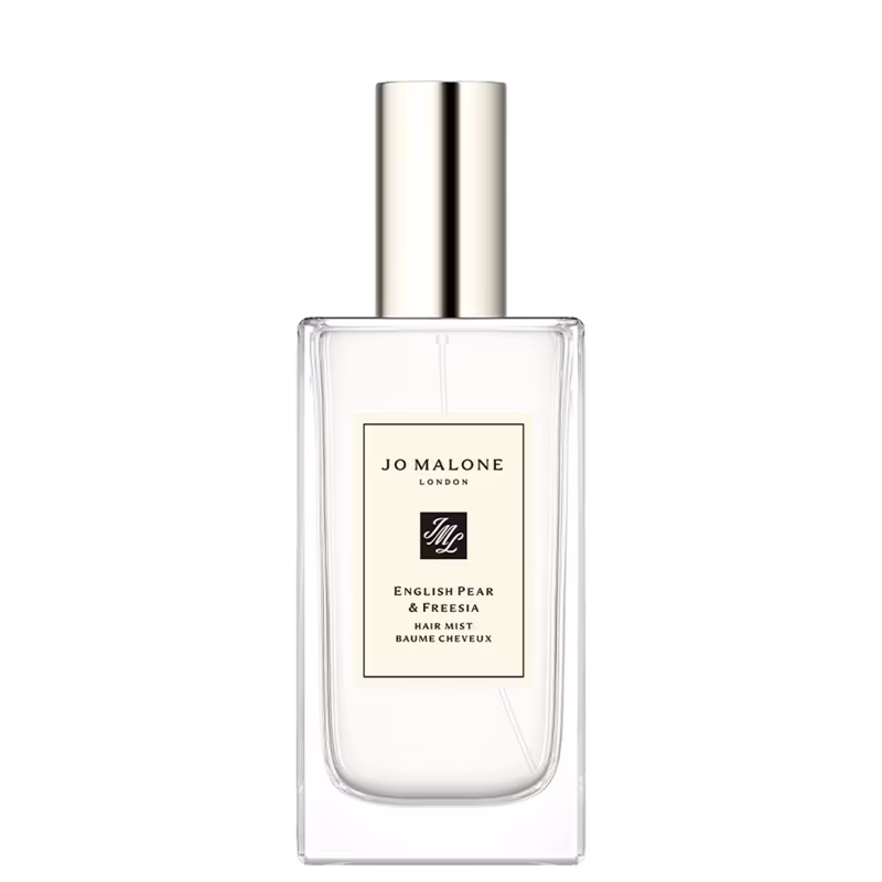 Frasco de perfume hair mist Jo Malone London com design elegante e minimalista, contendo o aroma "English Pear & Freesia". Embalagem de vidro transparente com rótulo preto e branco, destacando a marca e o nome do produto.