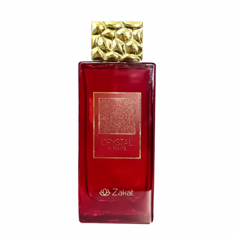 Frasco de perfume Zakat Crystal Carnate, com tampa dourada em formato geométrico e rótulo vermelho com detalhes dourados, apresentando uma fragrância exclusiva da marca.