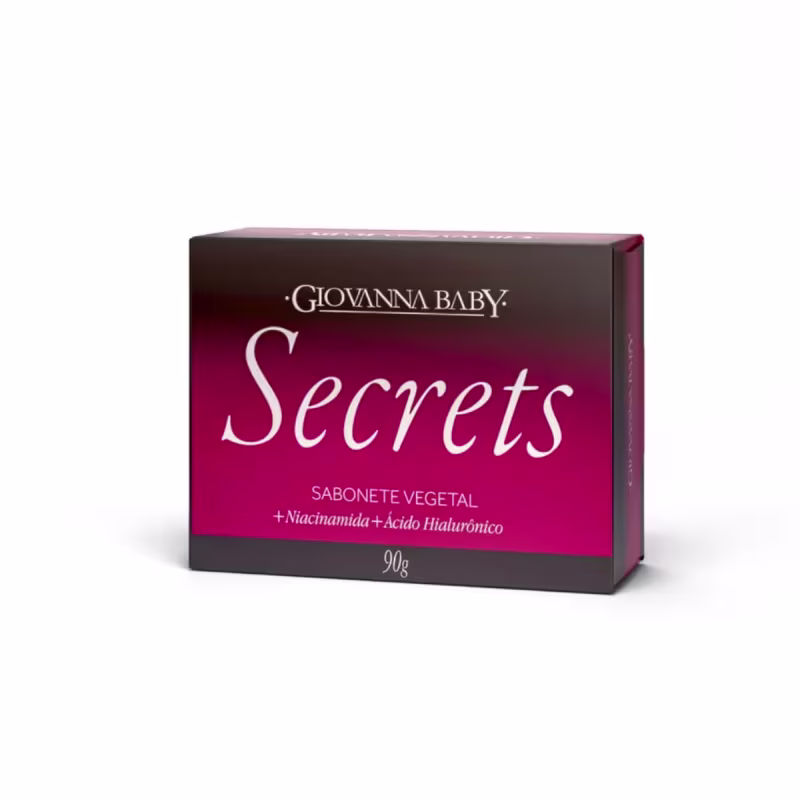Sabonete em barra contendo 90g da marca Giovanna Baby da linha Secrets em embalagem rosa com degradê preto, evocando sensualidade e sofisticação.